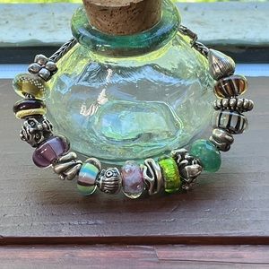 Trollbeads bracelet with glass and sterling beads, one semiprecious stone bead
